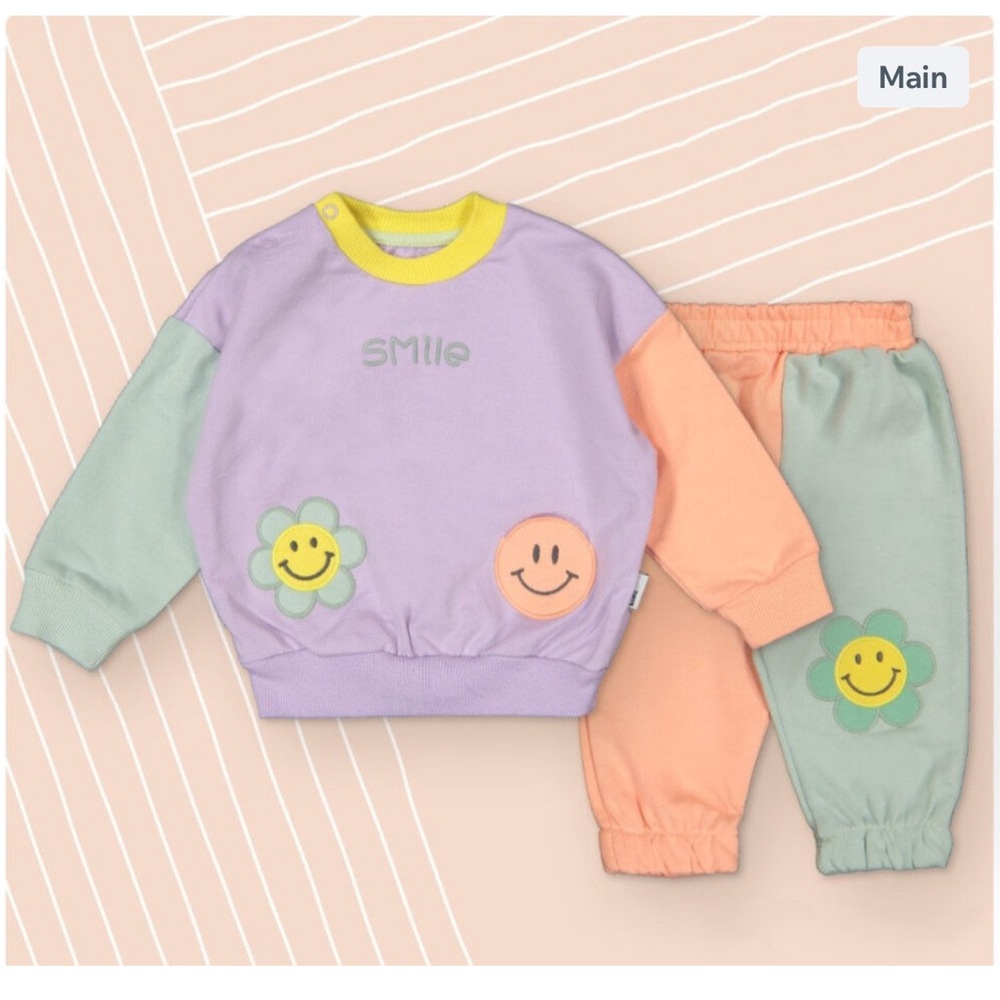 Unleash Your Playful Side with Our Flower Power 2 Pcs Trucksuit Set!